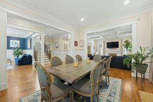 a dining room with a table and chairs at The Classy Craftsman - Beautiful Decor & Pool in Atlanta