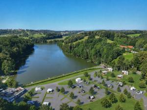 an aerial view of a river and a campgrounds at Forest Camping Resort Blaguš in Sveti Jurij ob Ščavnici