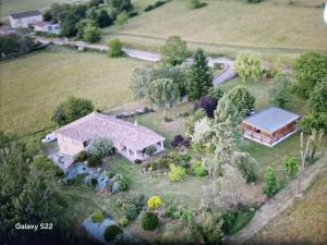 an aerial view of a home with a large house at Chalet GOURCE avec vue sur le Château in Foix