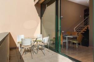 A seating area at Costabravaforrent Pedró