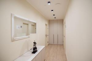 a bathroom with a sink and a mirror on the wall at Da Niko in Treviso +61 photos