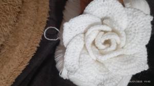 a roll of white rope sitting on a table at Hospedaje Mamani de isla amantani in Puno