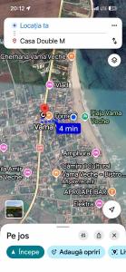 a screenshot of a cell phone with a map at Casa Double M, Vama Veche in Vama Veche