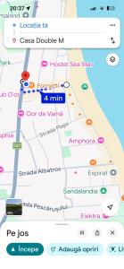 a screenshot of a cell phone with a map of versailles at Casa Double M, Vama Veche in Vama Veche