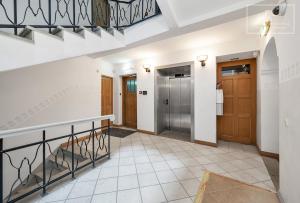 a house to rent with a staircase and a lobby at Boutique Flat - Spa Shower - Sound System in Tallinn