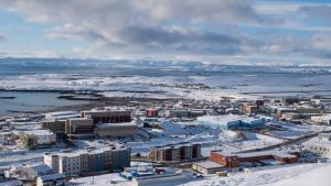 an aerial view of a city covered in snow at The Frobisher Inn in Iqaluit
