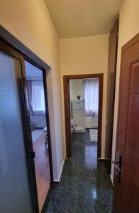 a room with a hallway with a door and a room with a room at Enjoy Eden in Constanţa