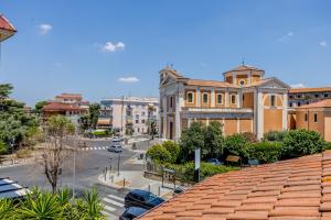 a view of a city street with a building at Fly&Rest Ciampino in Ciampino