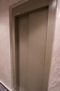 a sliding glass door in a wall at Marina plage in Kenitra