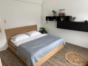 a bedroom with a large bed in a room at Quartier am Haff in Ueckermünde