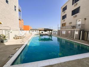 a swimming pool in the middle of a building at Oceanic Hotel in Wildwood