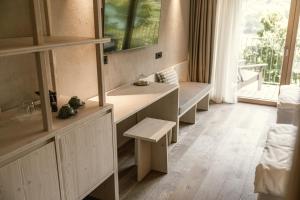 a bathroom with a sink and a mirror at Hotel Tulie in Most na Soči +51 photos