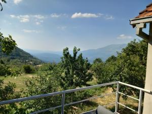 a view of the mountains from the balcony of a house at Apartman Selišta in Danilovgrad