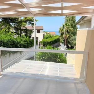 a view from the balcony of a house at Mare D'amare in Diamante