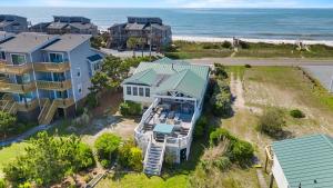 an aerial view of a house and the ocean at Luxury Waterfront & Oceanfront Beach Paradise in North Topsail Beach