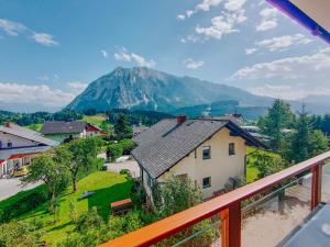 a view of a mountain from a balcony at Apartment Gemini by Salzkammergood Living in Tauplitz