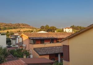 a group of buildings with hills in the background at DaMaHouse in Monastir