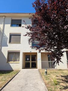 a building with a walkway in front of it at Studio Issoire pour 2 adultes et 1 enfant in Issoire