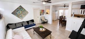 a living room with a couch and a table at Miami City Hostel in Miami