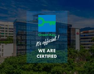 a sign that says green key its official we are certified at Arena Ipanema Hotel in Rio de Janeiro