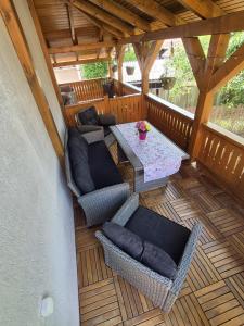 an overhead view of a patio with a table and chairs at Casa De Oaspeti Anna in Sovata