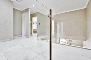 a large room with a mirror on the wall at Magic garden in Vereeniging +3 photos