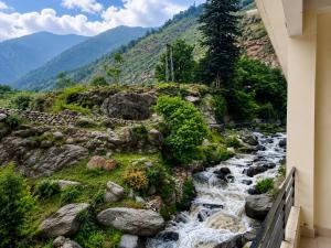 a view of a river from a building at Sukoon Hideout Kaghan Valley in Lahar Bānda