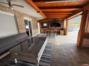 a living room with a couch and a table at Magic Aria Bihac in Bihać