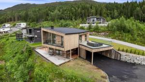 an aerial view of a house on a hill at Villa in Stryn in Stryn
