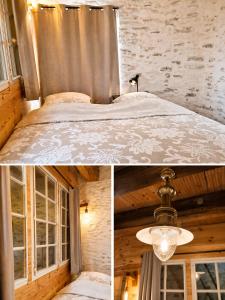 a bedroom with a bed and a chandelier at Le Moulin Neuf, logements atypiques dans le Pays d'Ancenis in Anetz