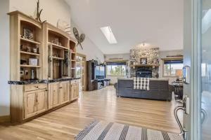 a large living room with a couch and a kitchen at Mountain Retreat - Deck Views - Sleeps 10 in Black Hawk +51 photos