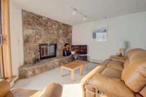 a living room with a couch and a fireplace at 432 Marina Place in Dillon