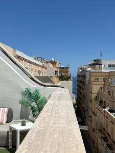 a view from the roof of a building at Cute little Penthouse in the Heart of Sliema in Sliema