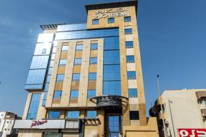 a building with a sign on top of it at Akarem New - Al Safa - اكــارم - الصفا in Jeddah