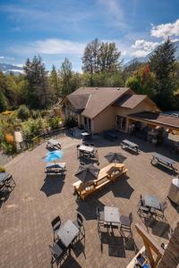 an overhead view of a patio with tables and chairs at Executive Suites Hotel and Resort, Squamish in Squamish