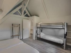 a bedroom with two bunk beds in a room at Lac Bleu 40 in Lacapelle-Marival +27 photos