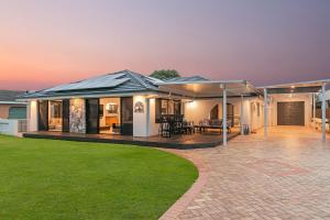 a home with a patio and a house at Salthill in Tweed Heads