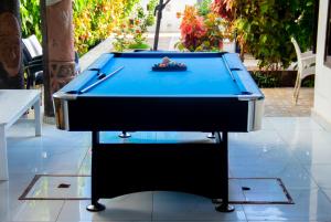 a pool table sitting on top of a table at ASVA BEACH Resort in Grand-Popo