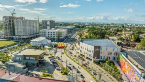 an aerial view of a city with buildings at Sweet Escape Executive Studio at One Regis in Bacolod