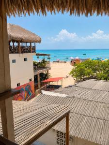 a view of the beach from a resort at ECOHOTEL LILI in Puerto Limón