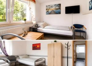 a living room with a couch and a table at Ferienwohnung Bailey in Laupheim