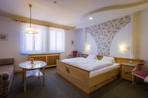 Posteľ alebo postele v izbe v ubytovaní Das-Schmidt Privathotel + 37 fotografií