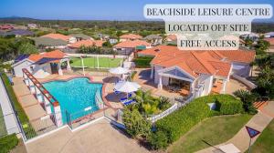 an aerial view of a house with a swimming pool at Breakers 1-3 - Ocean Views - Stone Real Estate Yamba in Yamba