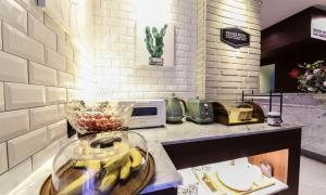 a kitchen with a counter with bananas on it at Brooks Hotel Tongyeong in Tongyeong