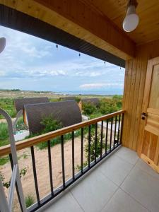 a view from the balcony of a house at Sarala Resort in Ostrov Kayrak