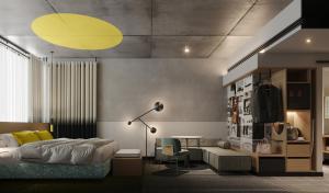 a bedroom with a bed and a desk and a lamp at Atura Oran Park in Gledswood Hills