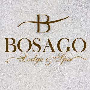 a sign that says bosacco lodge and inn at Bosago lodge and Spa in Burgersfort