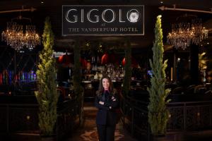 a woman standing in front of a restaurant at The Vanderpump Las Vegas Hotel & Casino - A Caesars Rewards Destination in Las Vegas +22 photos