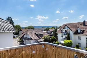 a view from the balcony of a residential suburb at bleib. Boutique Fewos Bodensee in Radolfzell am Bodensee