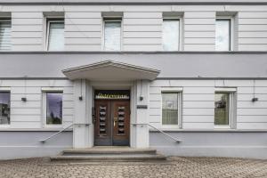 a building with a door in front of it at Ferienwohnung Ostermann in Plettenberg